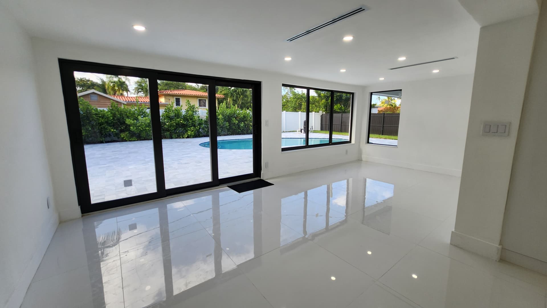 New hurricane impact windows and sliding glass doors on a Florida home